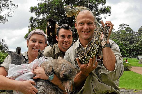 CREATIVE CREATURES: Allira Murphy, Trent Burton and Nick Schilko with a mix of native and exotic wildlife at the Shoalhaven Zoo.