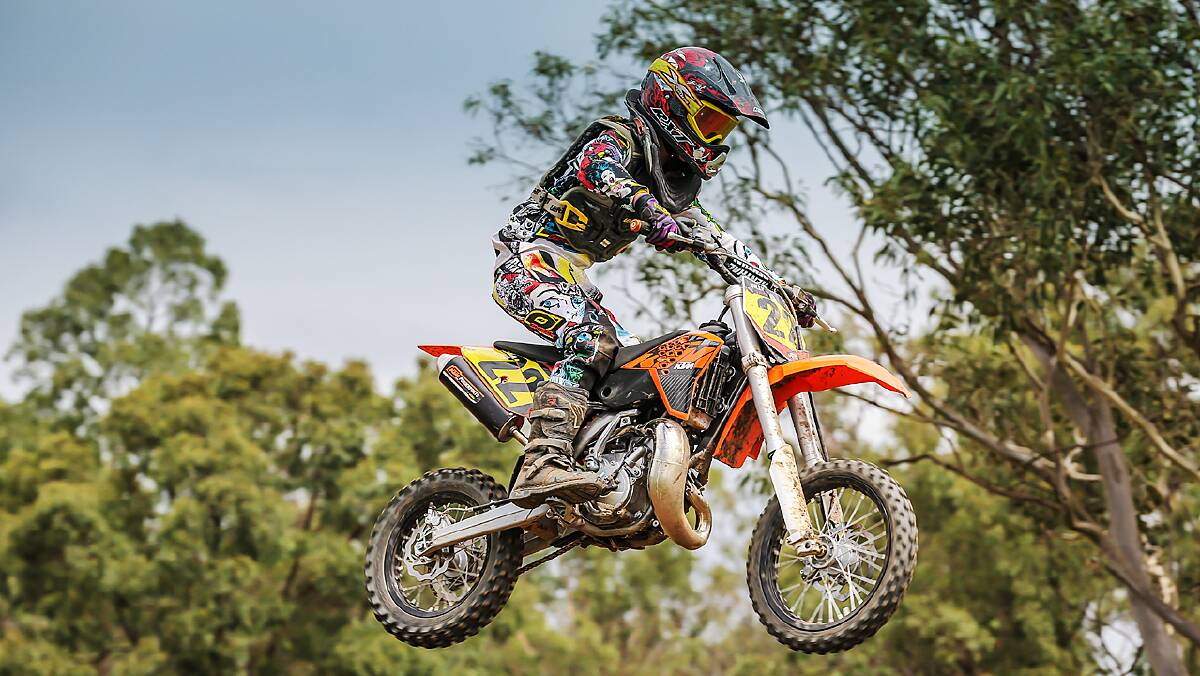 FLYING HIGH: Sussex Inlet racer Billy “The Kid” Payne flies off a jump at last weekend’s East Coast MX series. Photo: MX PHOTO