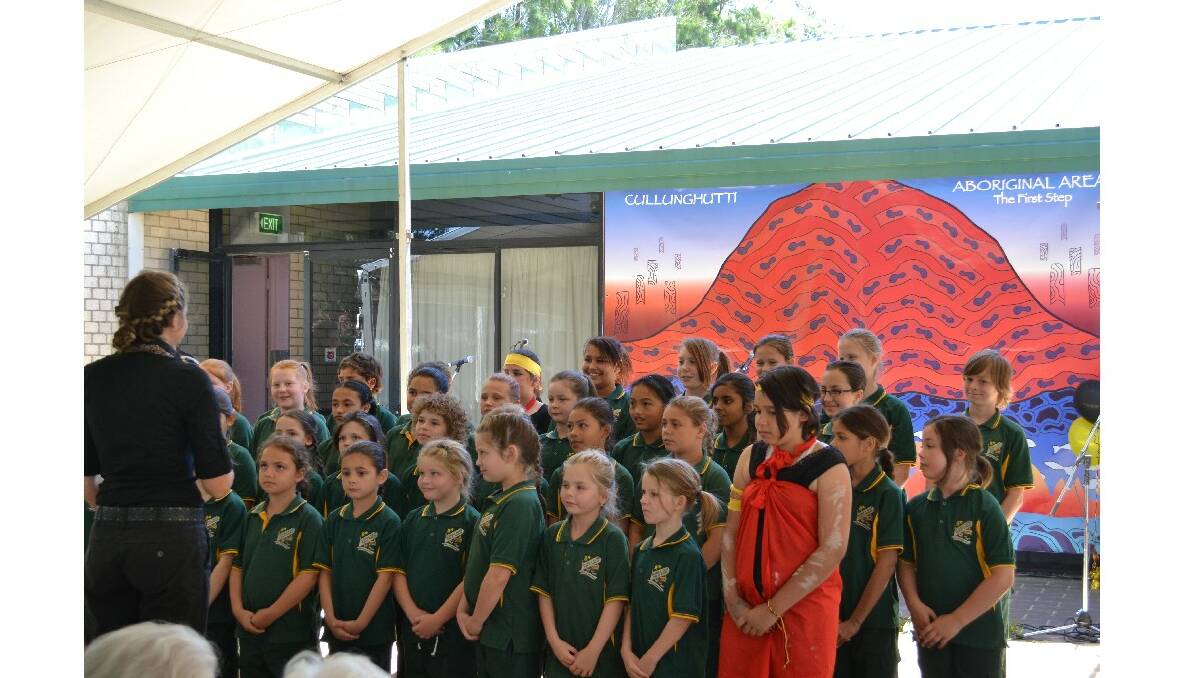 The East Nowra Public School choir sing their hearts out at the Cullunghutti Aboriginal Area community celebration at the Shoalhaven Heads Community Centre on Friday.