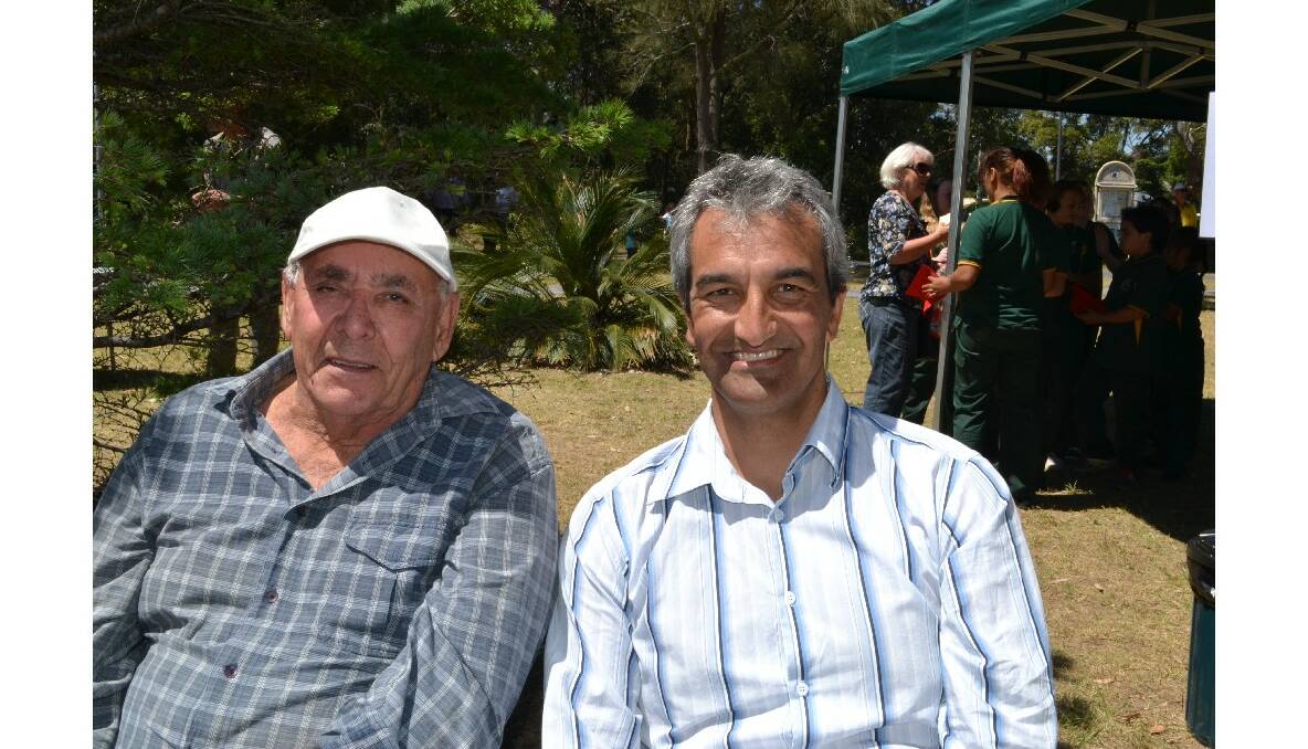 Les and Jason Ardler from Ulludulla at the Cullunghutti Aboriginal Area community celebration at the Shoalhaven Heads Community Centre on Friday.