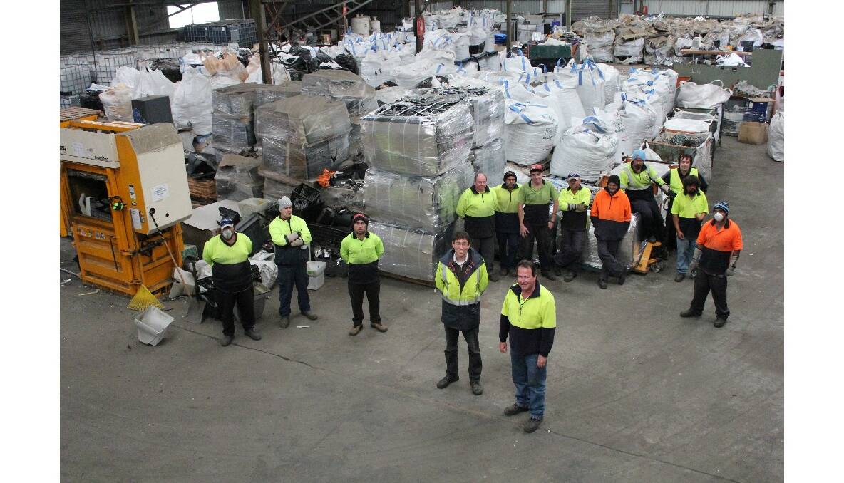 The TSR E-waste team in the recycling factory at South Nowra.