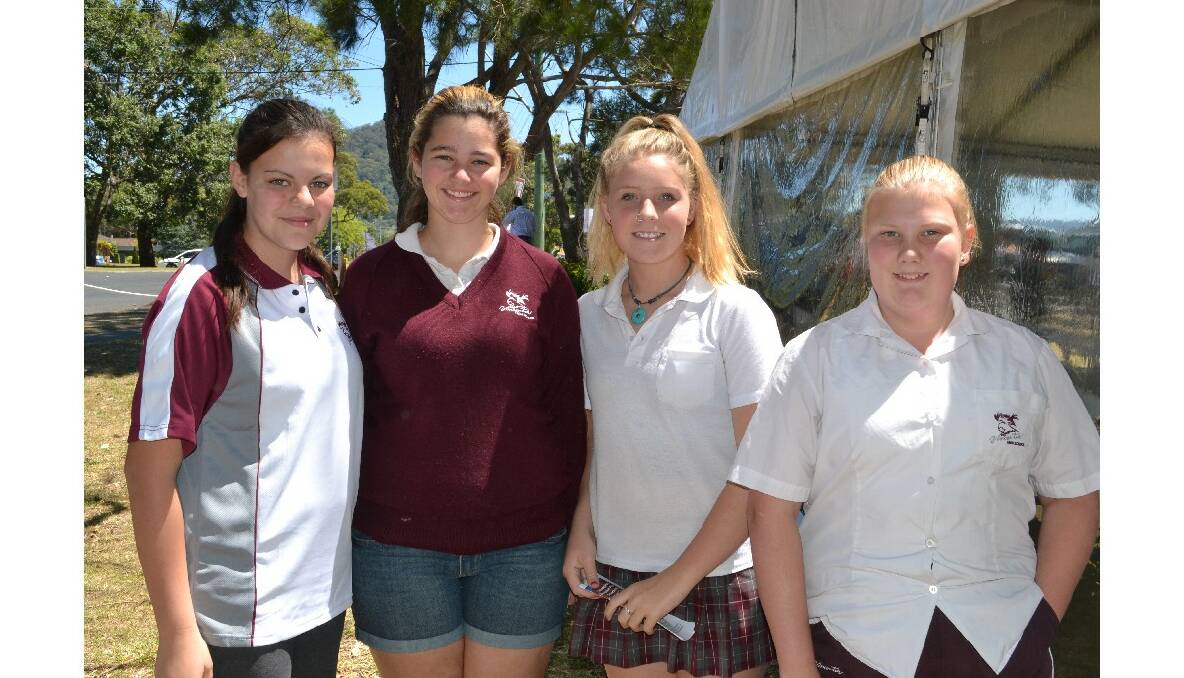 Catriona Ebzery, Nina Fisher-Brown, Tiana Heitel-Freeman and Maddison Bonser from Sanctuary point have a great time at the Cullunghutti Aboriginal Area community celebration at the Shoalhaven Heads Community Centre on Friday.