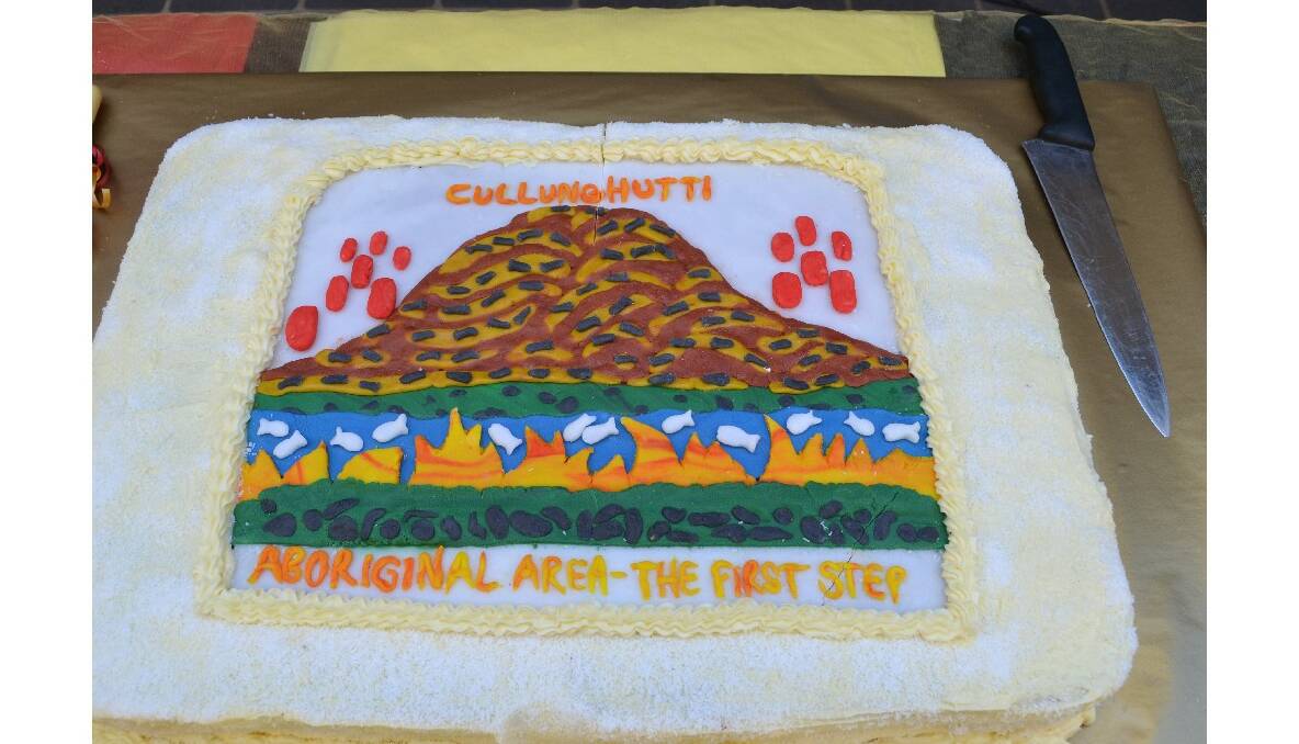 The celebratory Cullunghutti Aboriginal Area cake was cut at the Cullunghutti Aboriginal Area community celebration at the Shoalhaven Heads Community Centre on Friday.