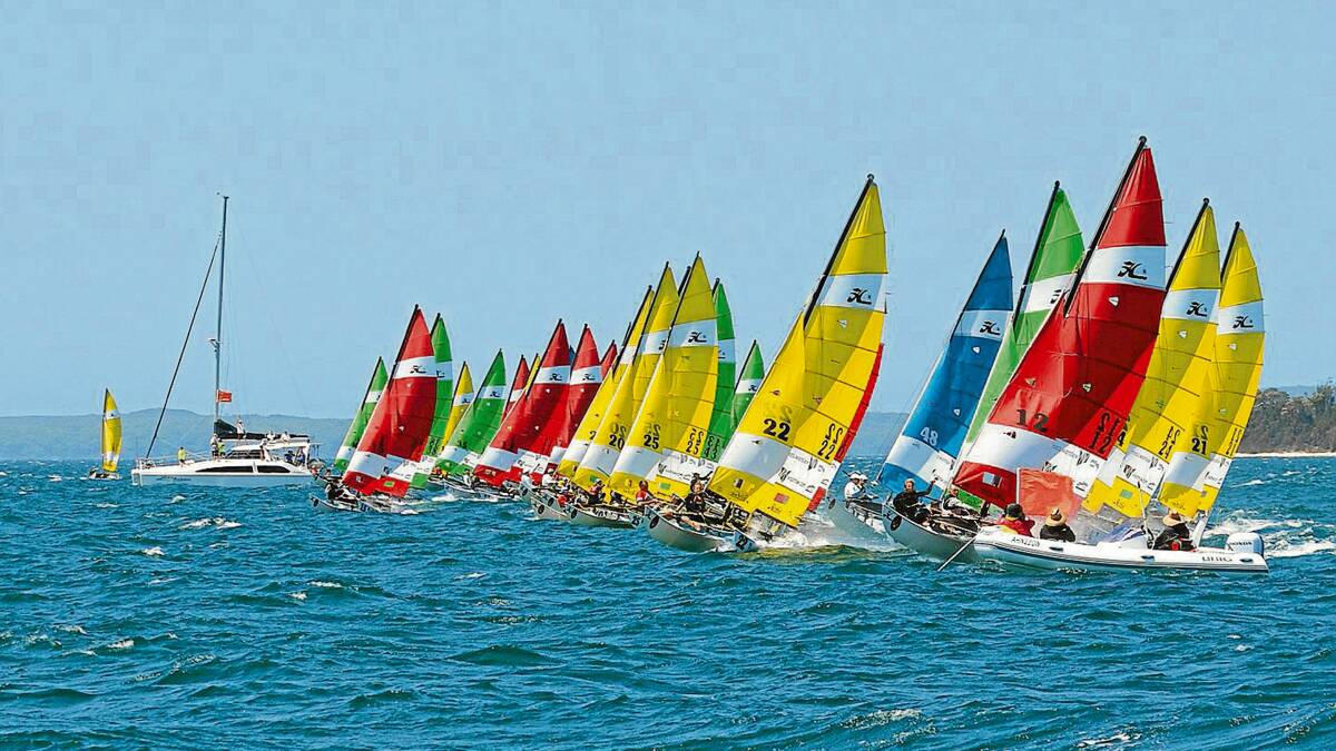 TIGHT FIELD: Some of the action from day three of the 20th Hobie 16 World Championships in Jervis Bay.  Photo: Courtesy of Steve Fields from Hobie Cat Australasia. 