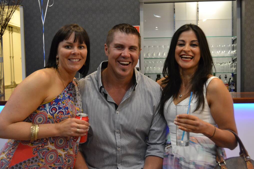 PARTY GOERS: Monique Binskin from Nowra, Troy Evans from Newcastle and Tracy Richardson from Sydney having a great time at the Nowra High Class of 92 Reunion on Saturday night.