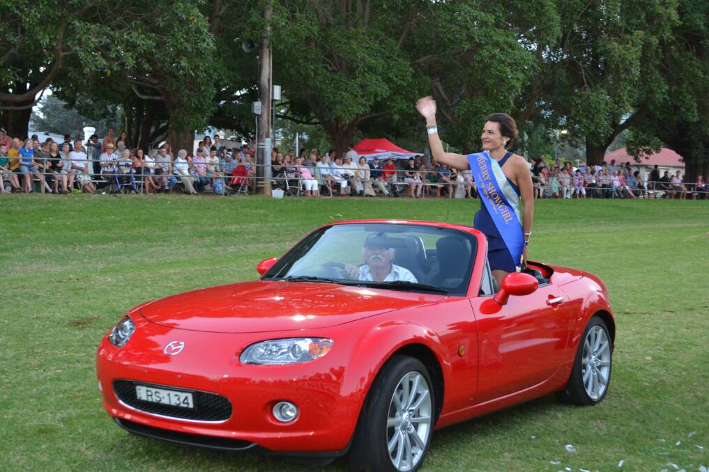 VICTORY LAP: Mikhaela Gray from Berry takes a victory lap after winning the 2014 Berry Showgirl at the Berry Show on Saturday.