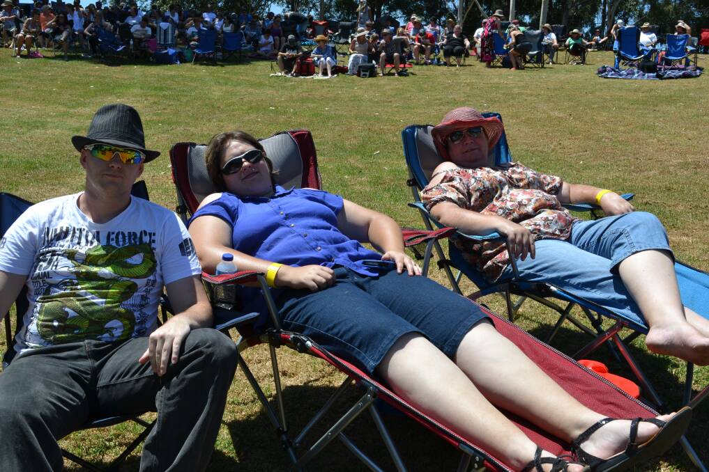 RELAXED: Relaxing in the sun at the Red Hot Summer Tour, Greg Bowers, Emily Mitskof and Kim Brown from North Nowra