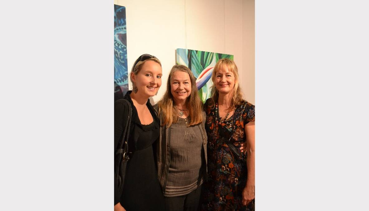 PAINTED CANVAS: Merindah Backer from Vincentia, Jenny Thompson and Megan Mulligan from Basin View have a great time at the NOW: Shoalhaven Contemporary Art Prize exhibition at the Shoalhaven City Arts Centre in Nowra on Saturday.
