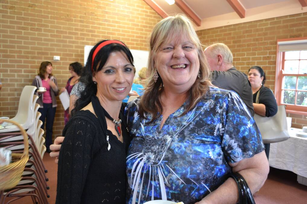 ALL SMILES: Nina Cheyne from Bangalee and Ros Rolleston from Nowra are having a great time at the 2014 Shoalhaven International Women’s Day Awards held at Nowra Showground on Saturday.