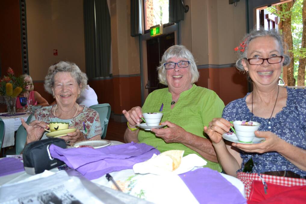 PINKIES UP: Betty Johnston from Berry with daughter Kay Johnston from Wattamolla and Cheryl Scowen from Terara at the Women and IT high tea to celebrate International Women’s Day.