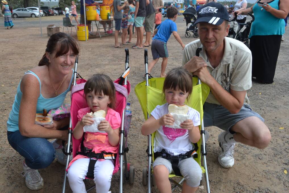 FAMILY: Tania, Lily, Lauren and Glenn Vaughan from Worrigee have a family day out at the Nowra Lions Club Kid’s Day Out at the Nowra Showground on Sunday.