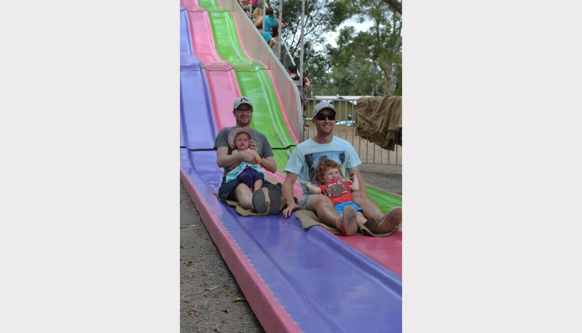 SLIPPERY DIP: Ryan, Amy, Kent and Hamish Omrod from Meroo Meadow have a ball on the giant slippery dip at the Nowra Lions Club Kid’s Day Out at the Nowra Showground on Sunday.