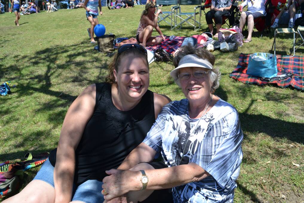 MOTHER AND DAUGHTER: Kristy Steicke from Sydney and Hennie Dewildt from Nowra having a great time at the Shoalhaven River Festival held on the banks of the River on Saturday.