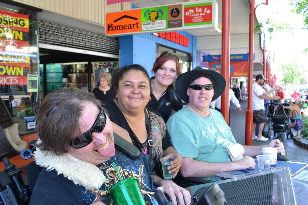 DAY OUT: Brett Barber, Cathie Bloxome, April Lee and Luke Brownjohn all from Bomaderry enjoy a day out at the Shoalhaven River Festival Parade on Saturday.