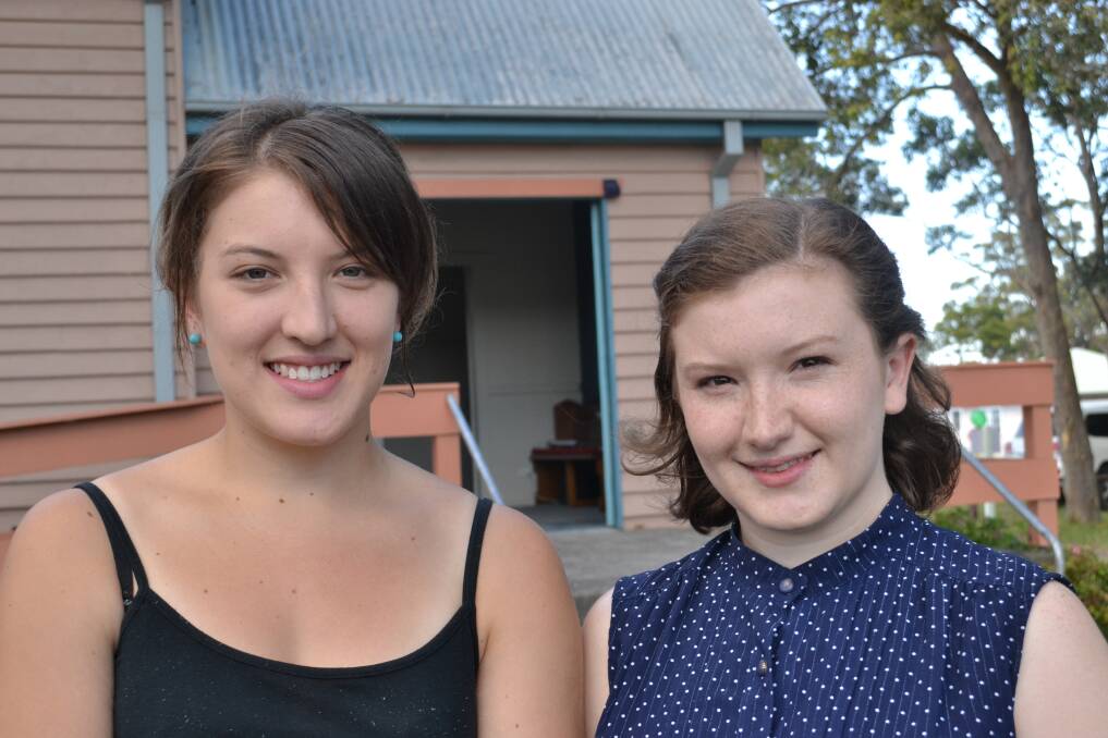 SISTERS: Emily and Jenny Soncum have come from Bomaderry to enjoy the annual Huskisson Anglican Church Free Christmas Family Fun Time on Sunday, December 8. 