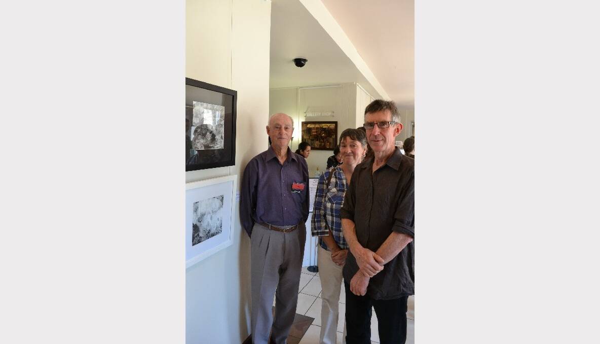 ART: John Saunders from Basin View, Linda Dening from Braidwood and Nick Powell from Terara view the art at the NOW: Shoalhaven Contemporary Art Prize exhibition at the Shoalhaven City Arts Centre in Nowra on Saturday.