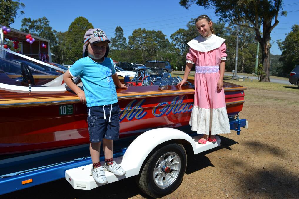 ALL ABOARD: Miles and Olivia Condon from Nowra waiting for the Shoalhaven River Festival Parade to begin on Saturday.