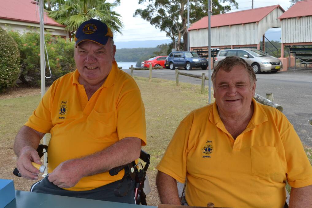 VOLUNTEERS: Fred Vormister and Stan Wilston from Nowra Lions Club volunteer at the Nowra Lions Club Kid’s Day Out at the Nowra Showground on Sunday.