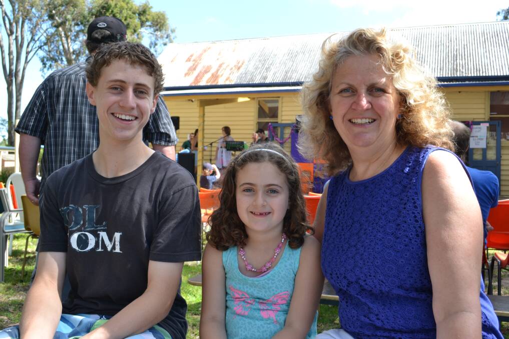 ALL SMILES: Luke, Sarah and Louise Goldman from Huskisson get ready to enjoy the Huskisson Anglican Church Free Christmas Family Fun Time on Sunday, December 8. 