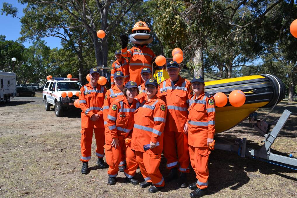 HERE TO HELP: Sue Pheeny, Wayne Remnant, Ben Pheeny, Allison Martin, Cheryl Bentley, Geoffrey Edwards, Sandra Zigra Rosie Foley and Anne Britton from the SES having fun at the Shoalhaven River Festival Parade on Saturday.