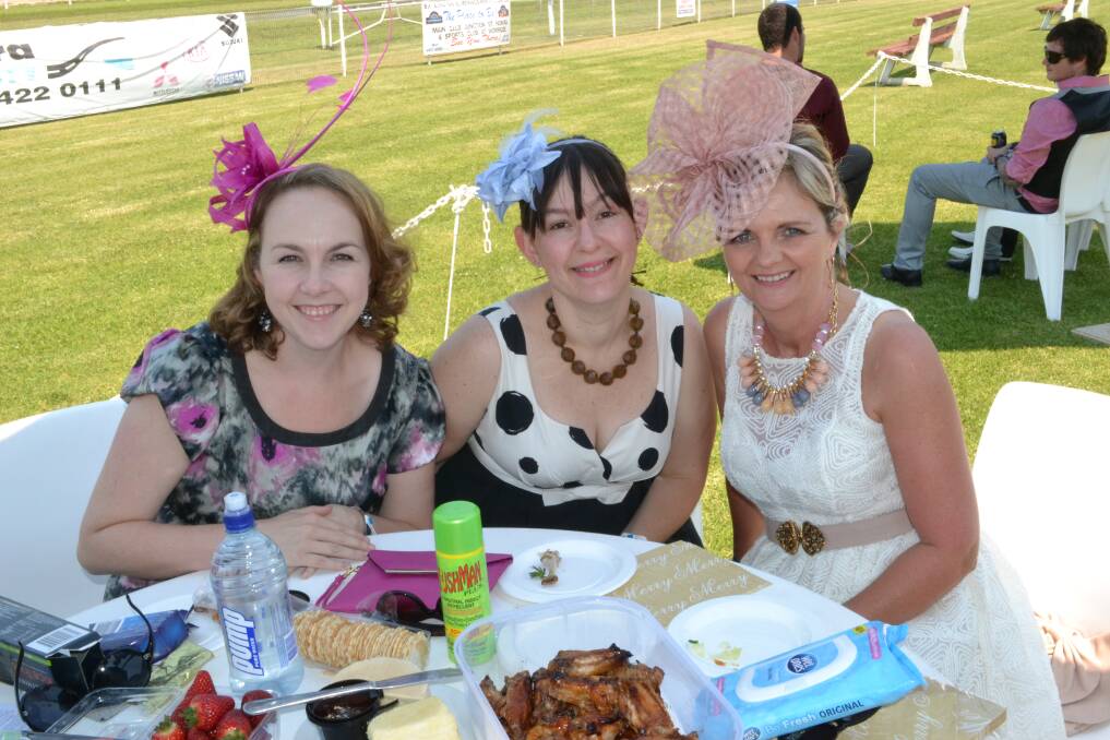 BET: Katherine Chappell from Lake Conjola, Rebecca Muir from Milton and Lynn Gunstone from Mollymook at the Mollymook Cup have a great time watching the horses at the Shoalhaven City Turf Club on Sunday.