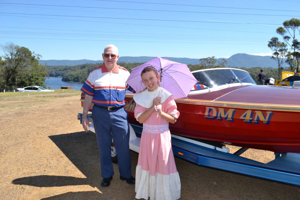 PARADE: Doug McDonald with the namesake boat he built 'Mr Mac' and Olivia Condon from Nowra preparing for the Shoalhaven River Festival Parade on Saturday.