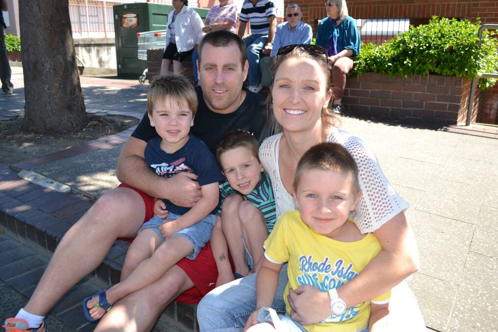 FAMILY: Cody, Michael, Noah, Suzi and Tyson Walker from Bomaderry enjoying a day out at the Shoalhaven River Festival Parade on Saturday. 