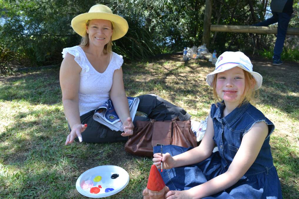 WATER COLOUR: Jeannie and Keturah Horne from North Nowra having a great time at the Shoalhaven River Festival held on the banks of the River on Saturday.