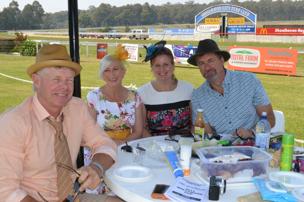 SUNDAY BEST: Garry Gunstone from Mollymook, Karen Caldwell from Milton, Kathryn Eiseman from Mollymook and Bruce Corke from Mollymook dress in their best clothes at the Mollymook Cup at the Shoalhaven City Turf Club on Sunday.