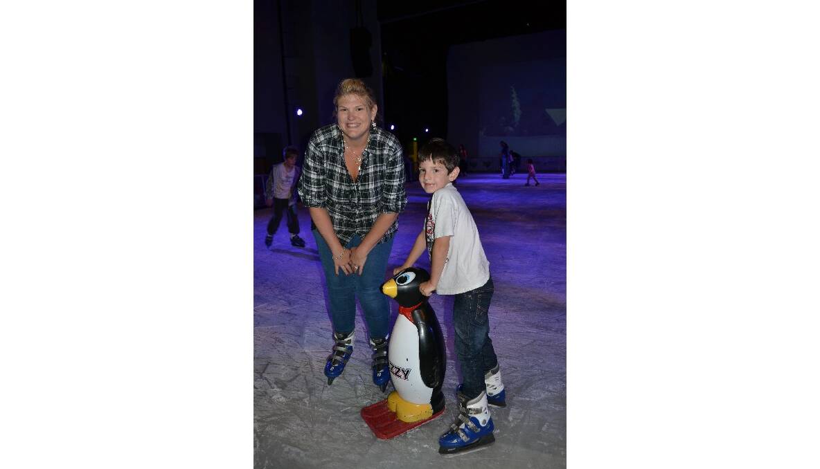 Nicole Hampton, of Sanctuary Point and her six-year-old son Cooper on the ice at the Shoalhaven Entertainment Centre for Ice Escape.