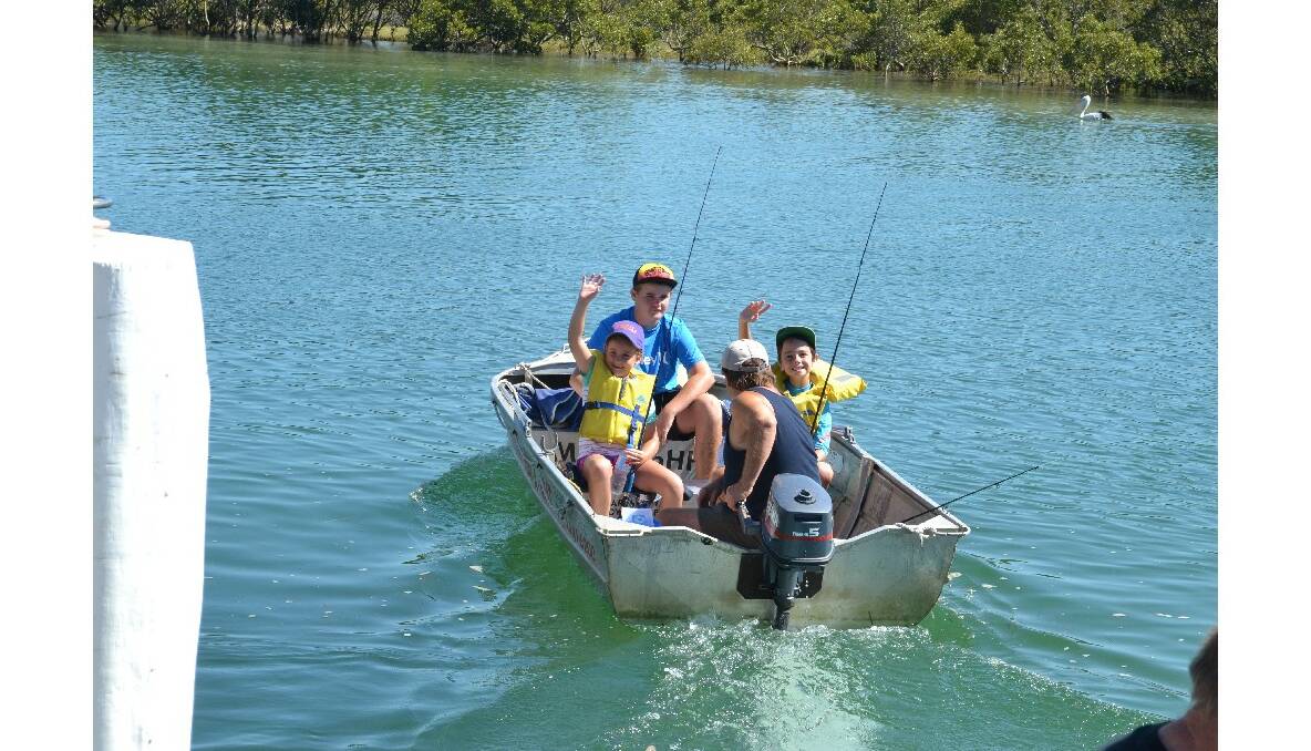 HITING THE WATER: Participants in the Huskisson RSL Fishing Club’s fishing school head out onto the water.