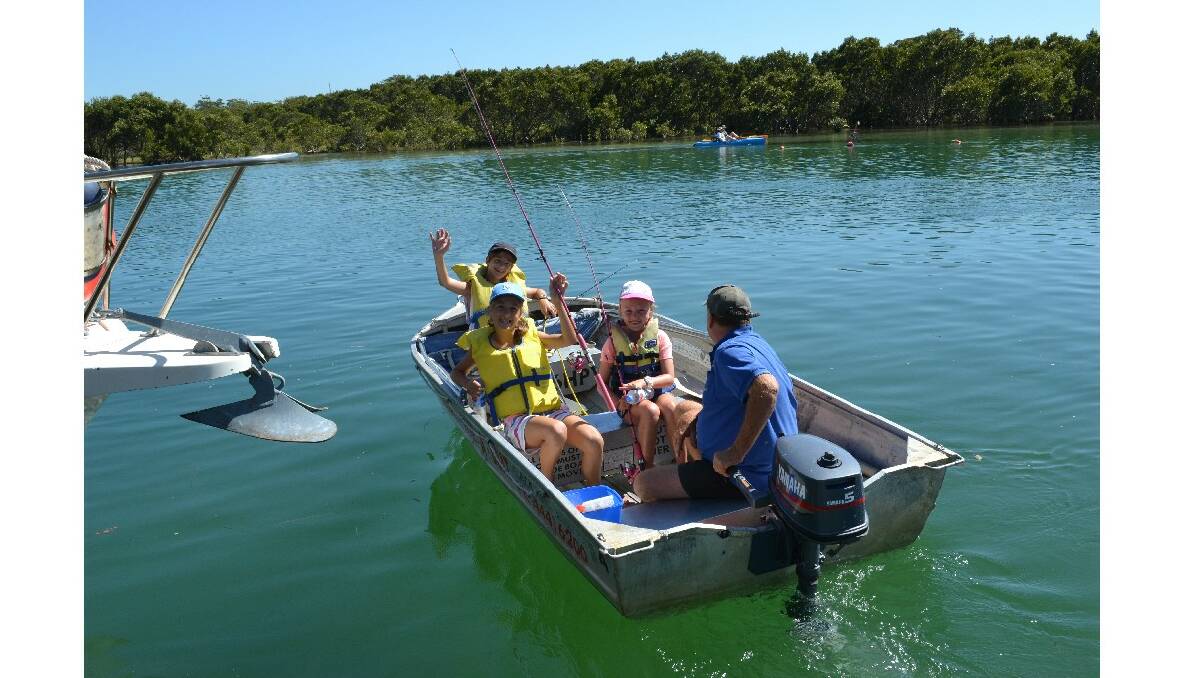 HITING THE WATER: Participants in the Huskisson RSL Fishing Club’s fishing school head out onto the water.