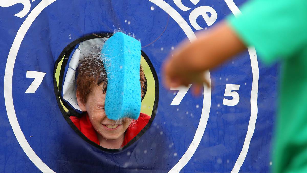 Year 5 student Hamish Sims, 10, was the target in the sponge-throw competition at Albury North Public School's water sports day. Picture: MATTHEW SMITHWICK, Border Mail