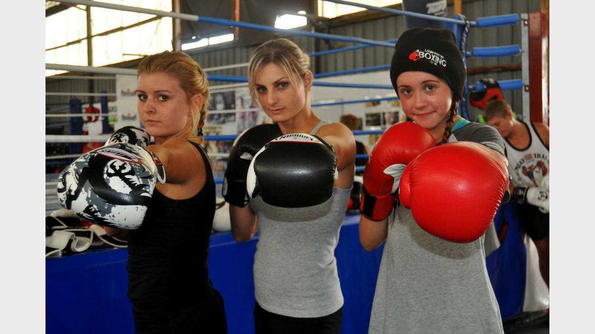 Danni Clayton, 14, Carle Parish, 27 and Teagan Collins, 14, are gearing up for a weekend of boxing. Picture: Manika Dadson, The Examiner