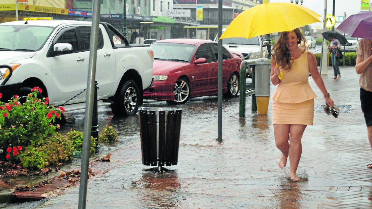 The Advocate’s Sophie Harris was amongst those caught in a downpour on Wednesday. Photo: The Daily Liberal