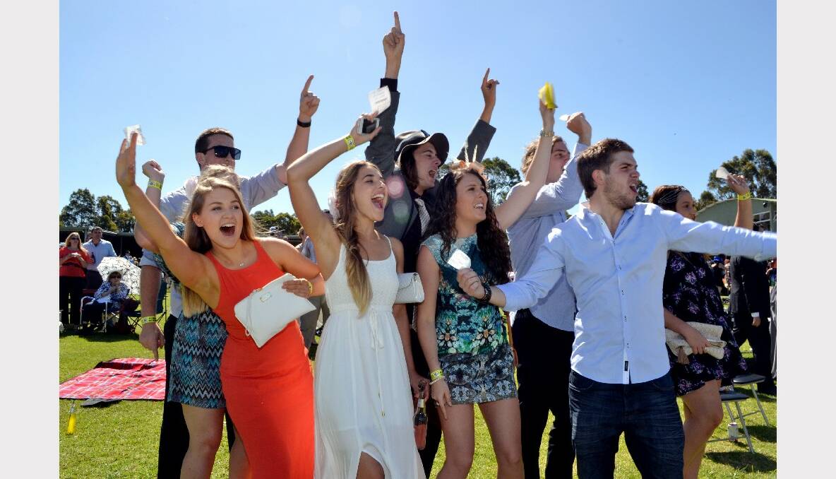 Kirsten Thone, Jordan Matthews, Tennielle Barnes, Leah Robinson, Jarryd Sue, Bridget Jackson, Mat Goode and Jamie Bailey get into the spirit of race day at the Shoalhaven City Turf Club’s Melbourne Cup day.