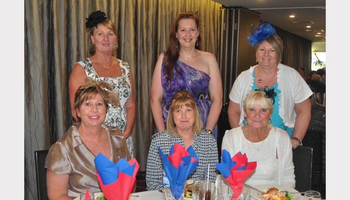 Bomaderry Bowling Club staff members (back) Narelle Cunningham, Karen Bradford, Stacey Parry with (front) Sharyn Duncan, Michelle Flanagan and Kim Walker put some glamour into yesterday’s event.