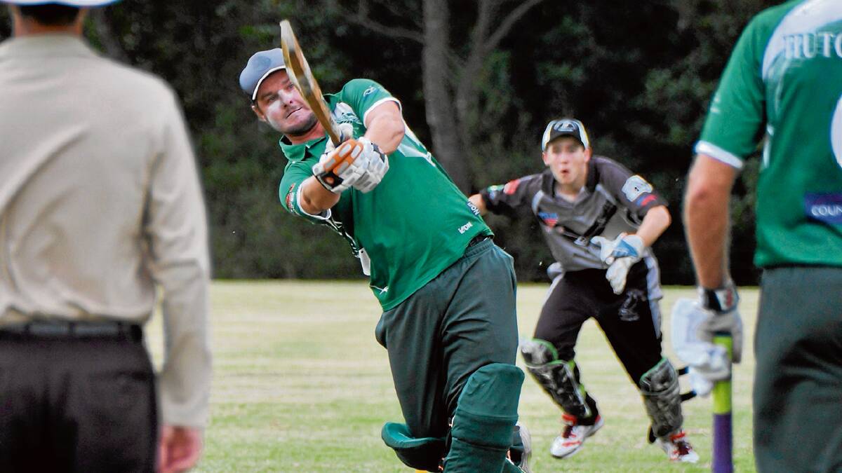 MAN OF THE HOUR: Nowra’s Chris Nation smashes a ball on his way to 46 runs in the one-day final on Sunday against Berry-Shoalhaven Heads.