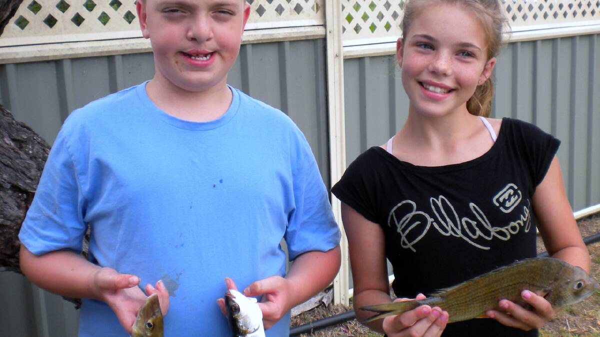PERFECT PAIR: Bomaderry RSL Amateur Fishing Club’s Jai Smith and Emily France show off their winning fish.