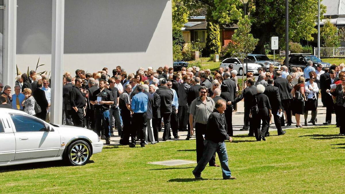 MOURNERS: A large crowd attended Monday’s funeral for respected long-time Glendon Motors and Country Motor Company owner Harry Buikstra.