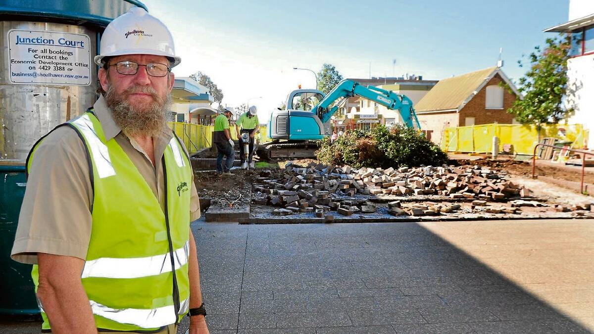 FRESH START: Construction supervisor Bill Garrick helped build Junction Court 21 years ago as a concrete finisher. He is pictured with the remains of the area after demolition began this week.